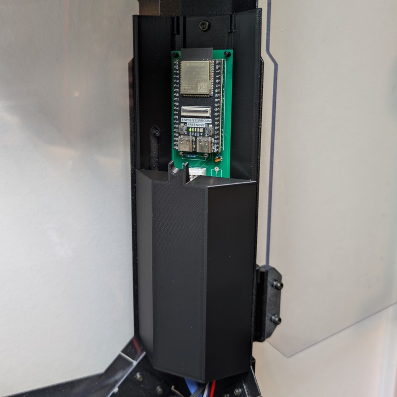 Lower cover properly seated on electronics holder.jpg