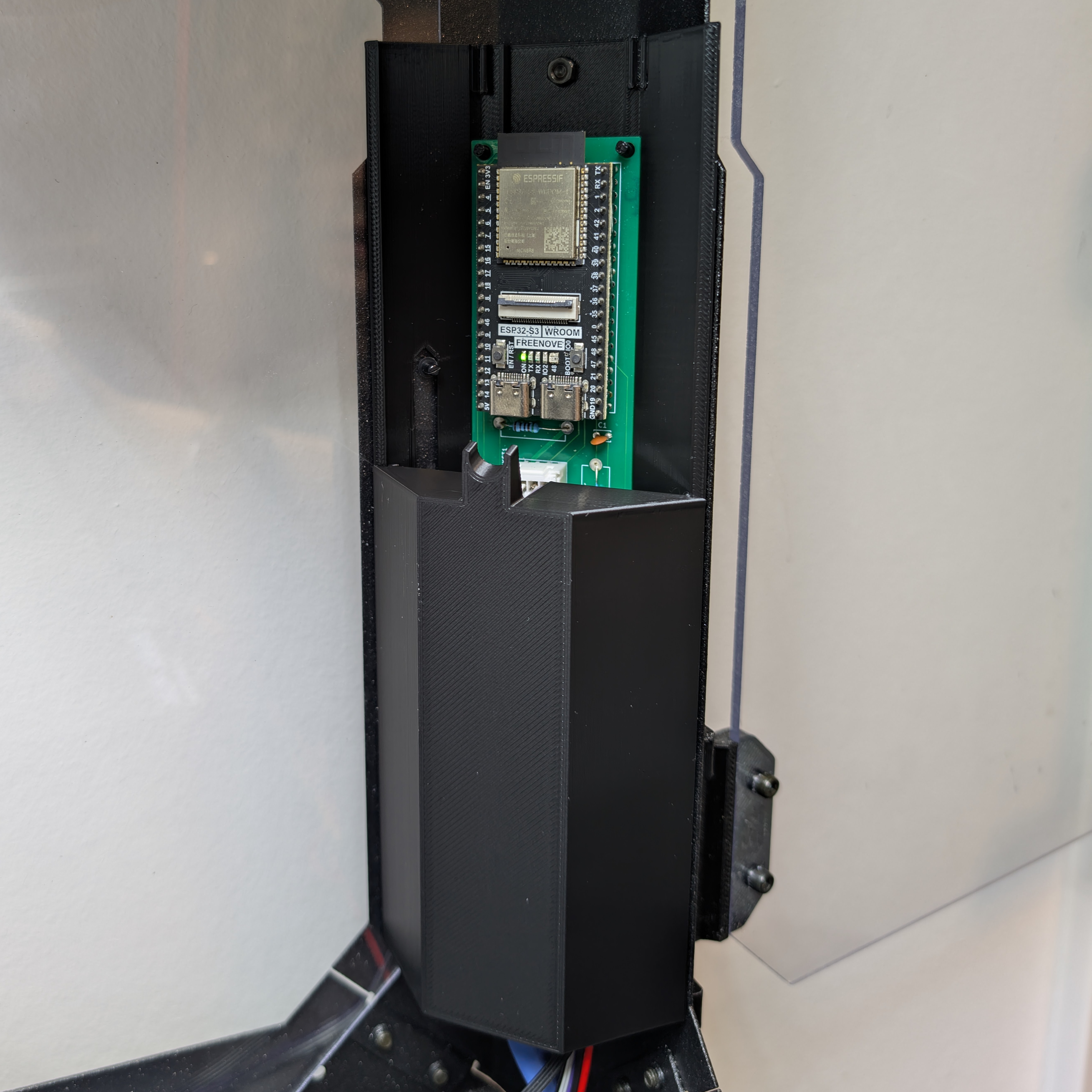 Lower cover properly seated on electronics holder.jpg