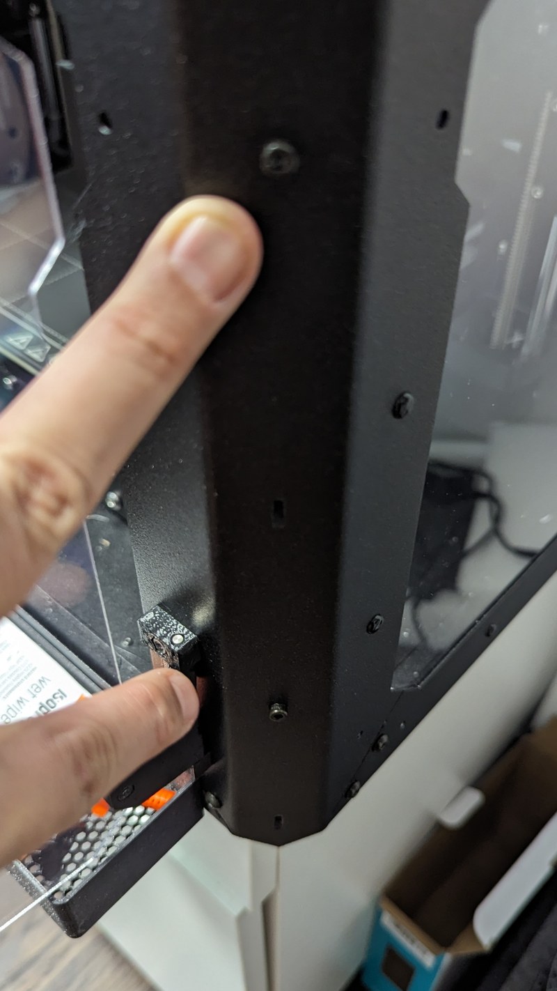 Screws affixed to the enclosure and the electronics holder.jpg